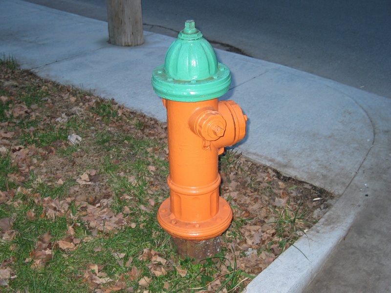 Green And Orange Fire Hydrant