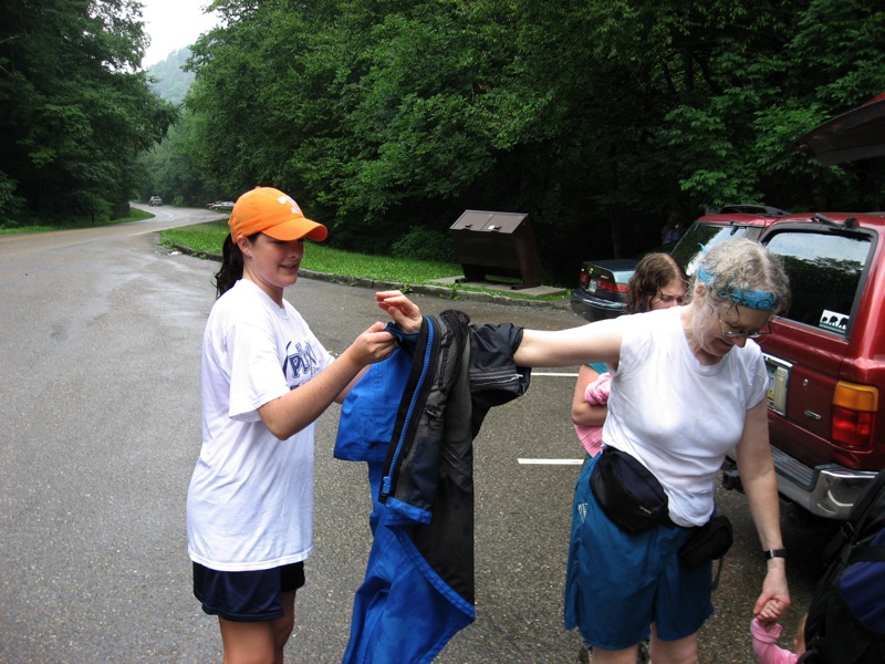 Megan Helps Joan With Her Jacket