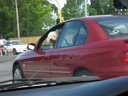 Thumbnail of Image- Dog Is Driving Car? How Can This Be?